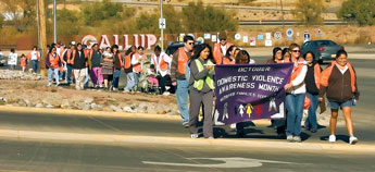 Approximately 50 members of the community participate in the Domestic Violence Awareness march Saturday, traveling from the Multi-Cultural Center to Ford Canyon Park in Gallup. Following the march participants listened as Lean Eskeets talked about the loss of her daughter, Brooke Spencer, after she was stabbed by her boyfriend in June of 2006. Copyright © 2010 Gallup Independent 